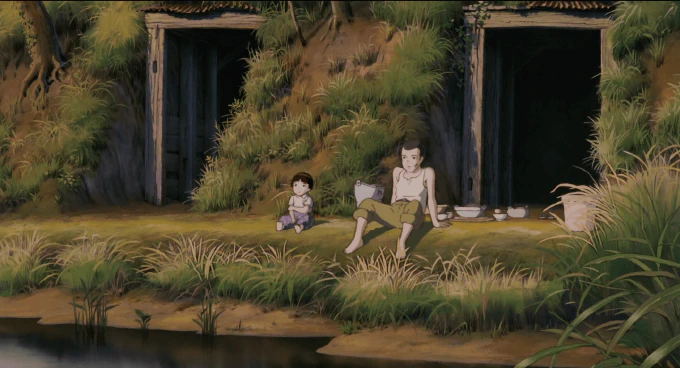 **Fig. 5.3** *Seita and Setsuko sitting in the sunset outside their makeshift shelter* Image of a brother and sister sitting outside a makeshift shelter